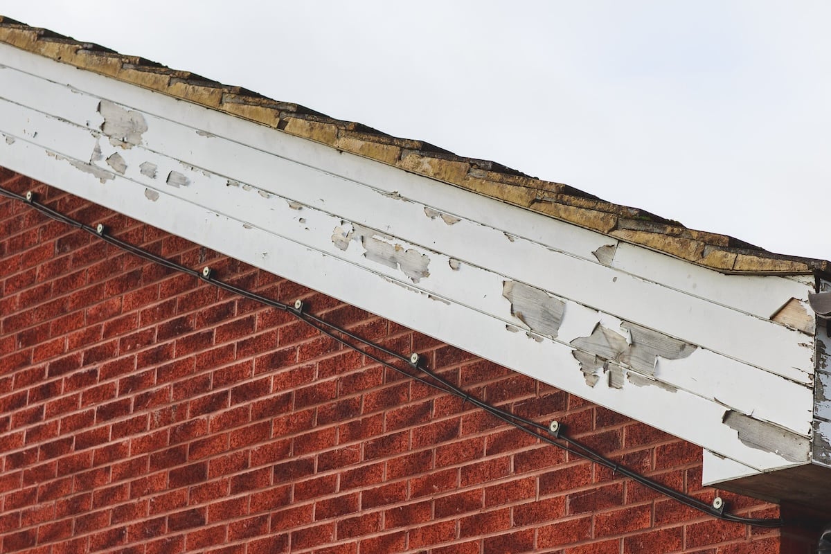 chipped and damage paint on fascia