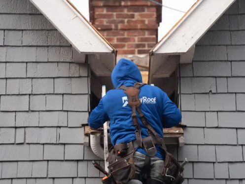 roofer on ladder